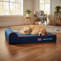 Blue pet bed with red trim and 'The Dog's Bed' branding on a white background